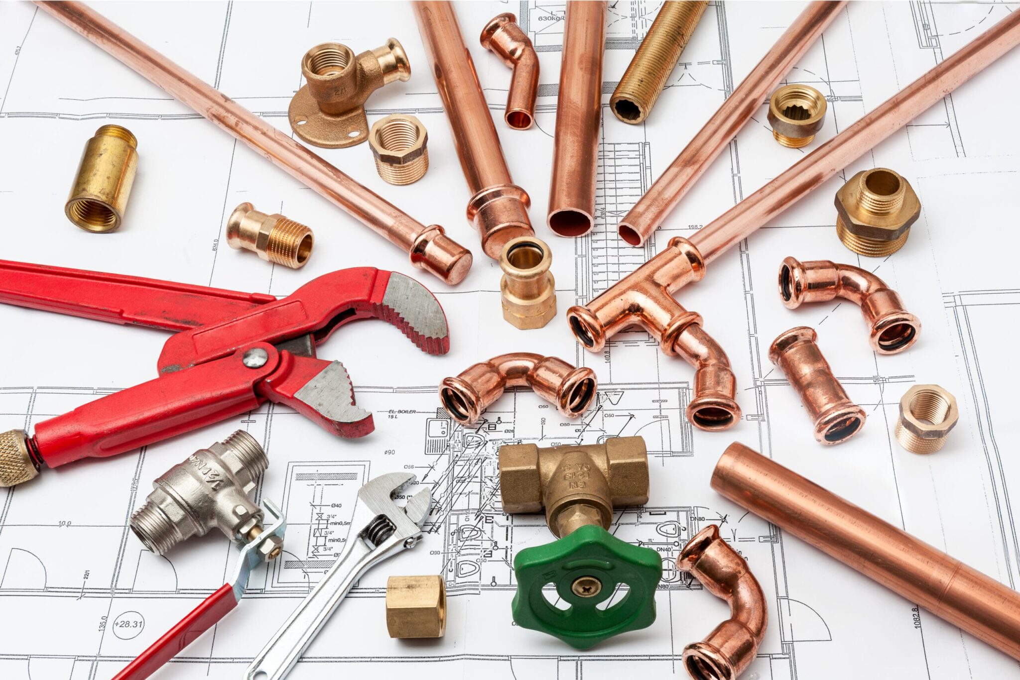 Copper pipes, fittings, valves, and plumbing tools in Englewood